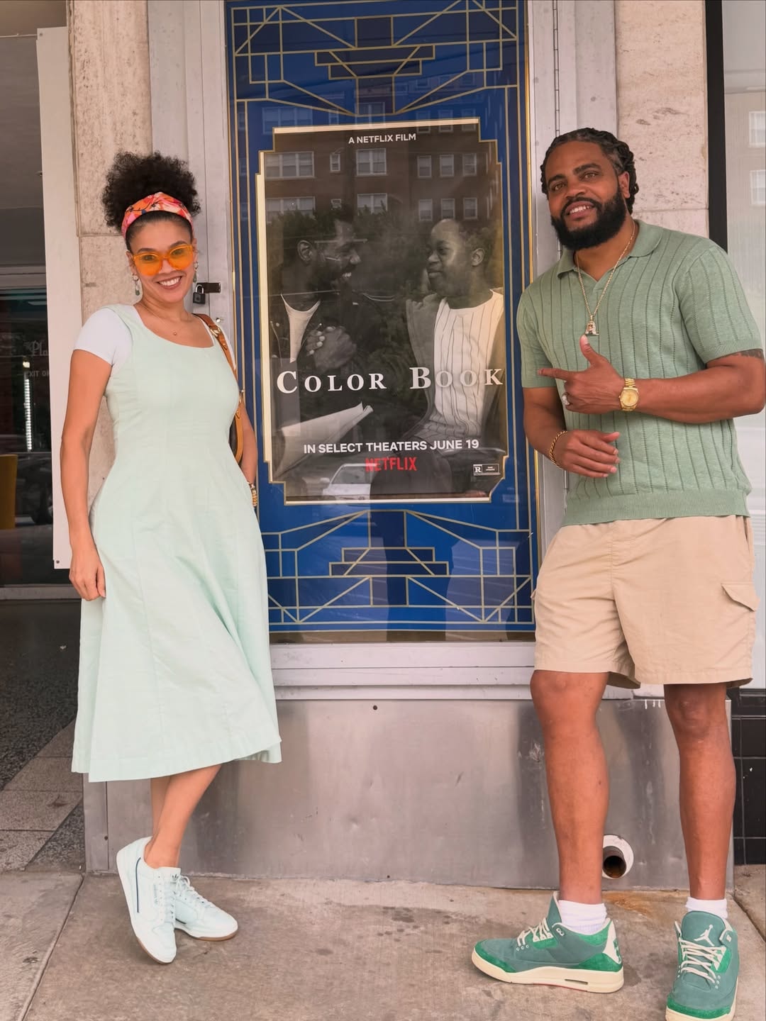 Color Book premiere — couple in front of Netflix poster